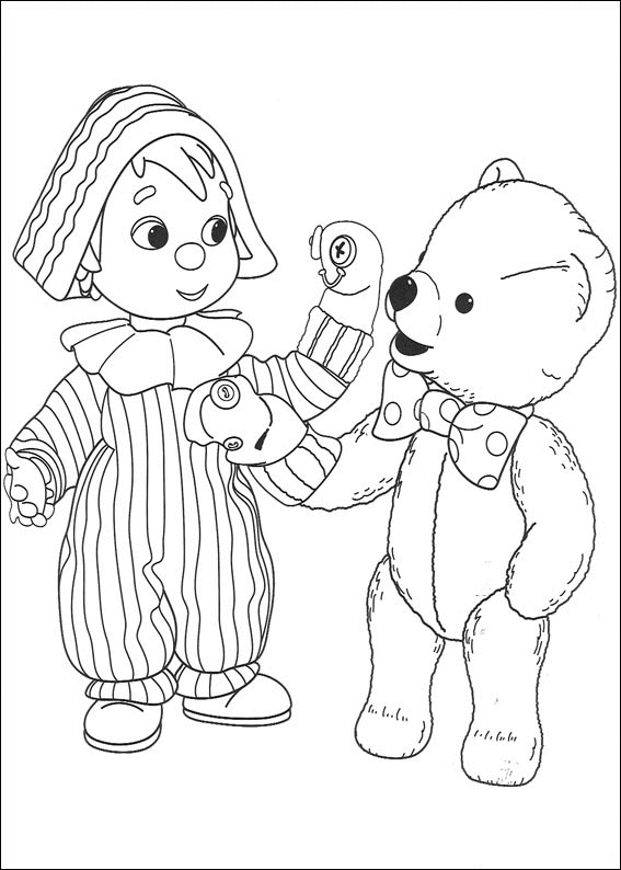 Andy Pandy jouant avec son ami dans un décor naturel