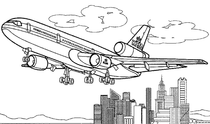 Un avion survolant un paysage nuageux