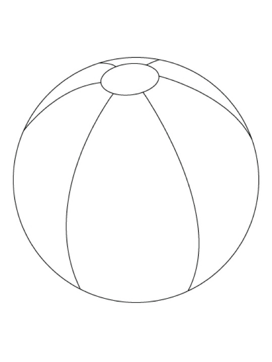 Un ballon de plage sur fond de sable