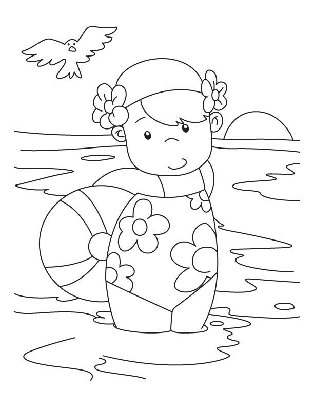 Coloriage d'un ballon de plage sur le sable