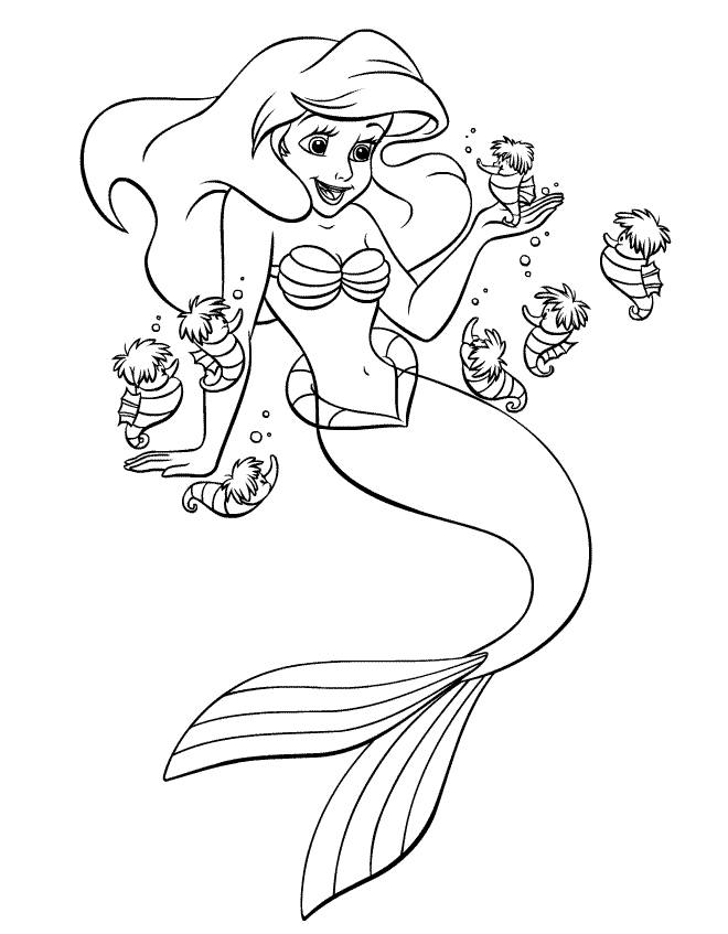 Barbie en pleine séance de coloriage avec son fidèle animal