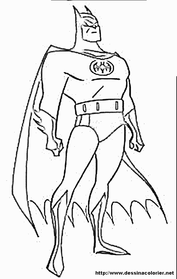 Batman en pleine action, sur fond urbain