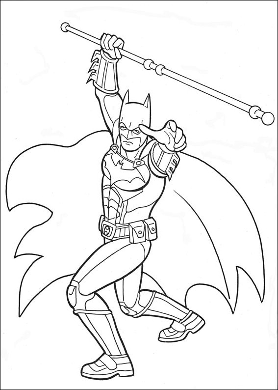 Batman en pleine action sur une toile de fond urbaine