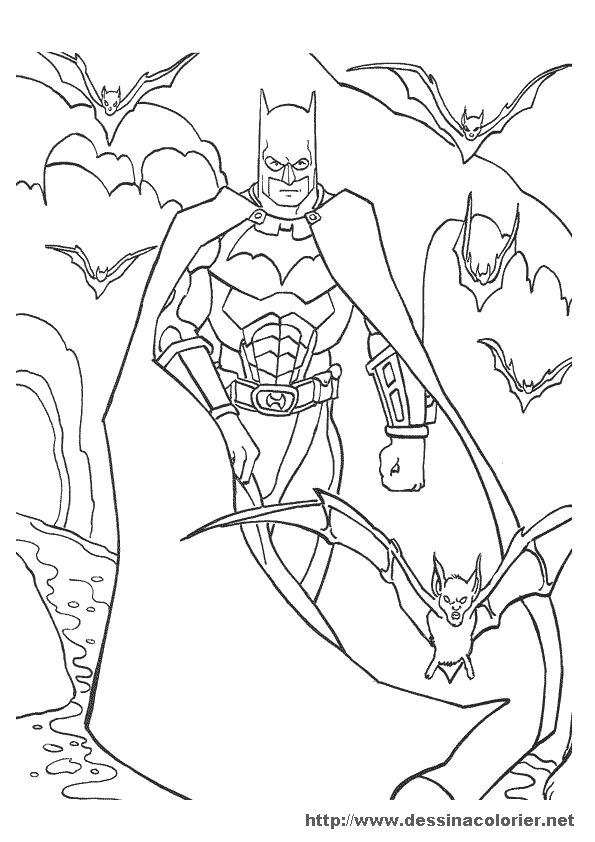 Batman en pleine action contre un ennemi dans la ville