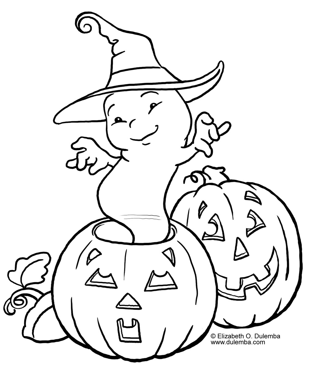 Coloriage d'une citrouille sur fond de feuilles d'automne