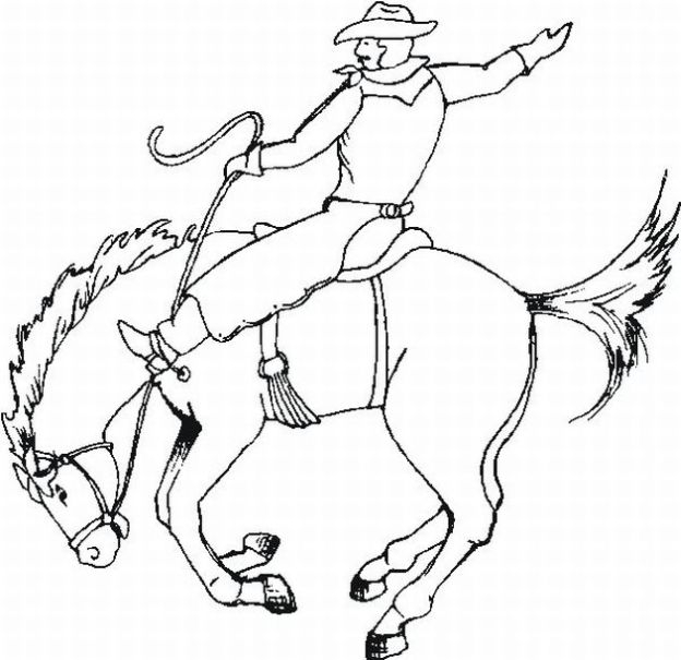 Un cowboy à cheval dans un décor de praire Un cowboy à cheval dans un décor de praire