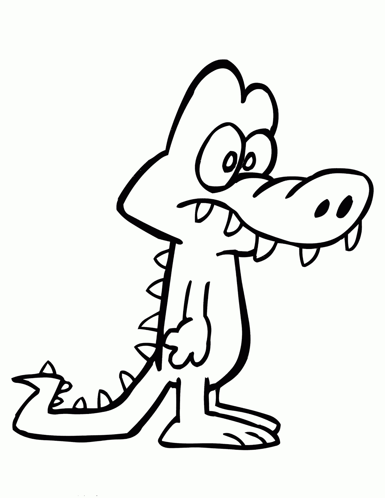 Coloriage d'un crocodile allongé au bord de l'eau