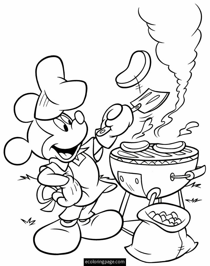 Un cuisinier en pleine préparation culinaire dans sa cuisine