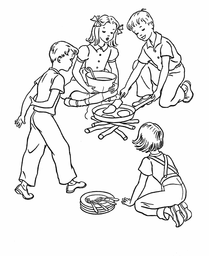 Un cuisinier en pleine préparation culinaire dans sa cuisine