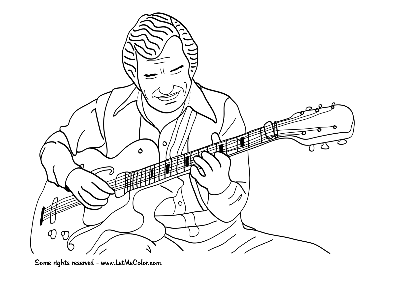 Un guitariste en pleine performance sur scène
