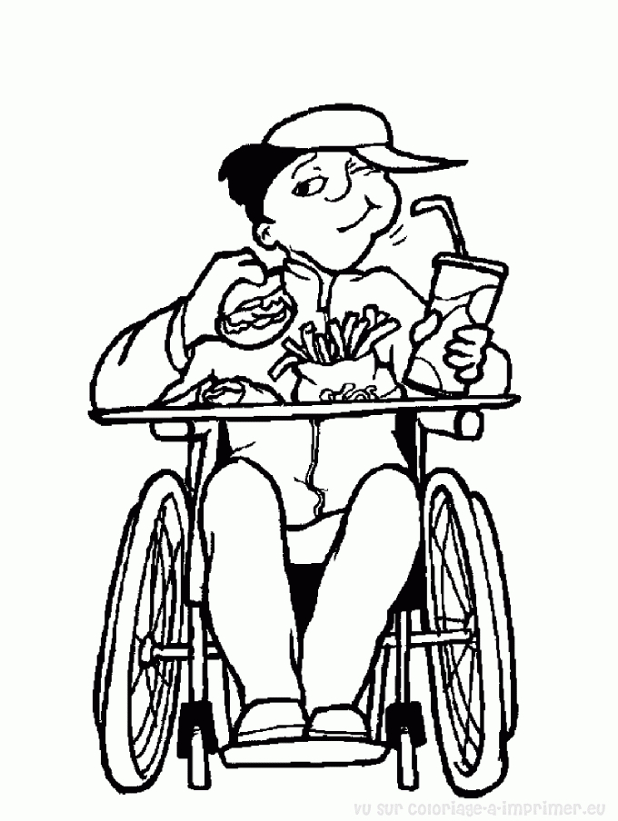 Un enfant en fauteuil roulant colorie avec joie un dessin inspirant