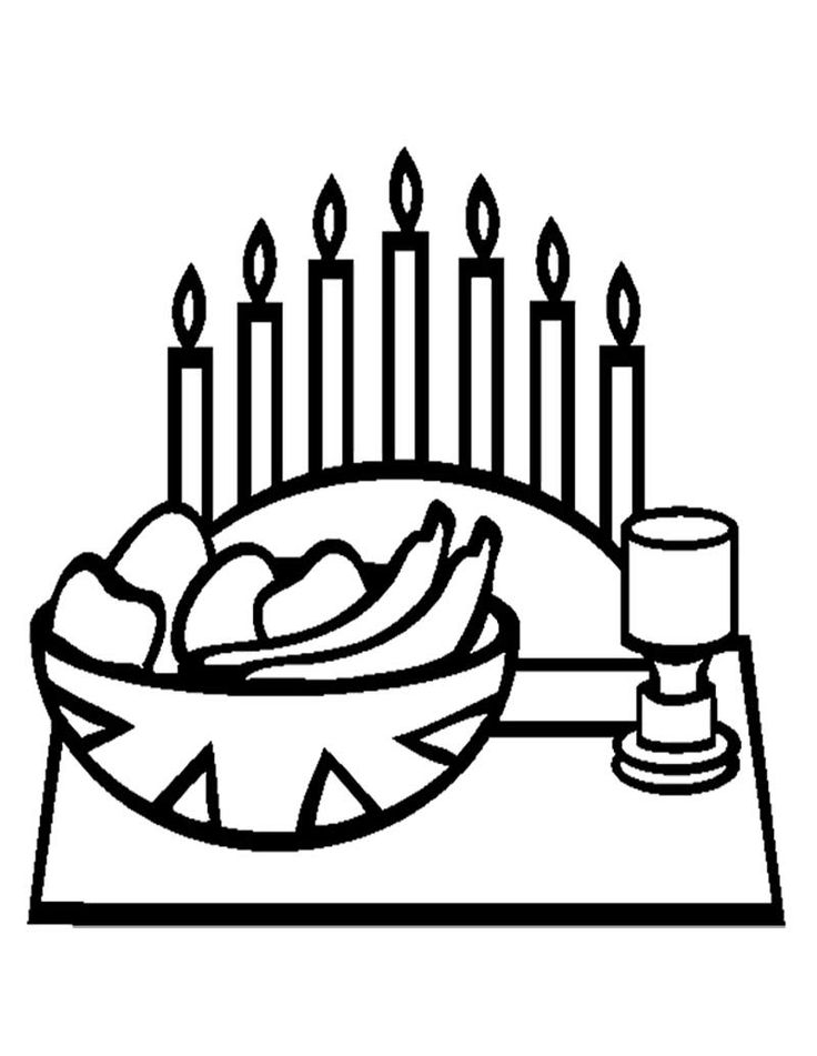 Scène de Kwanzaa avec des bougies et des symboles traditionnels