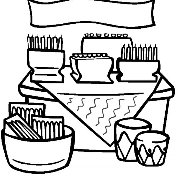 Coloriage représentant une célébration de Kwanzaa avec des éléments symboliques