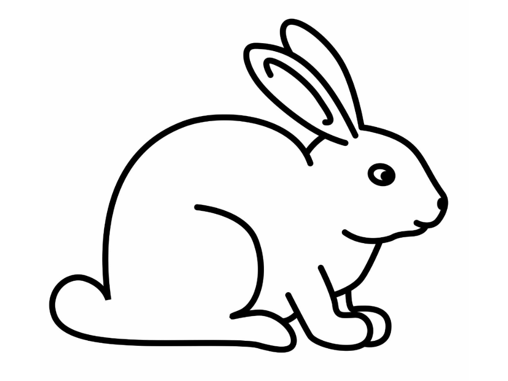 Lapin mignon assis dans un champ fleuri