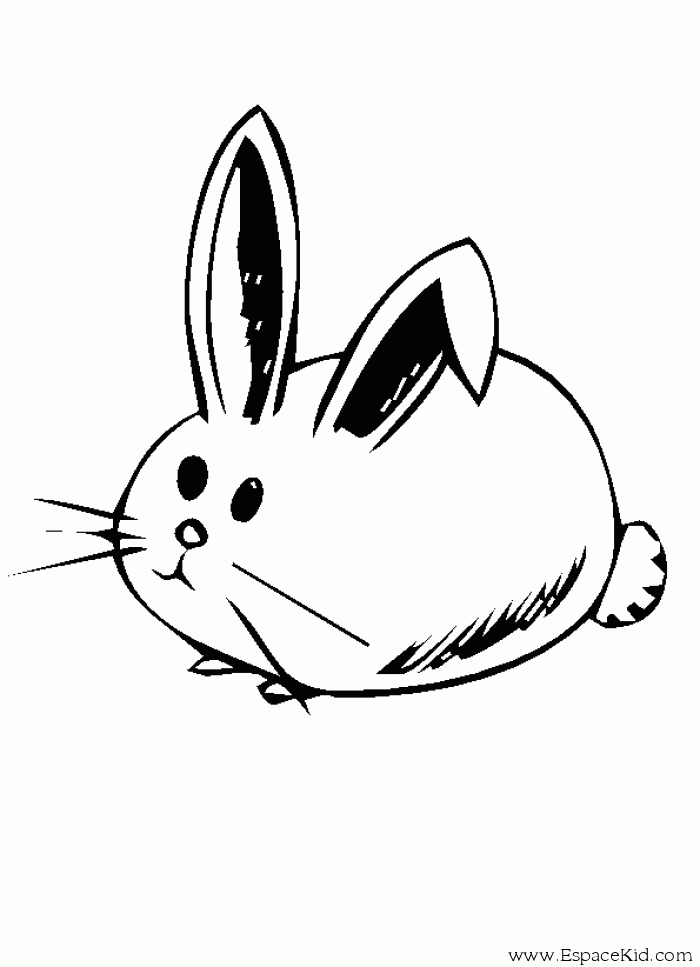 Un lapin joyeux dans un jardin fleuri