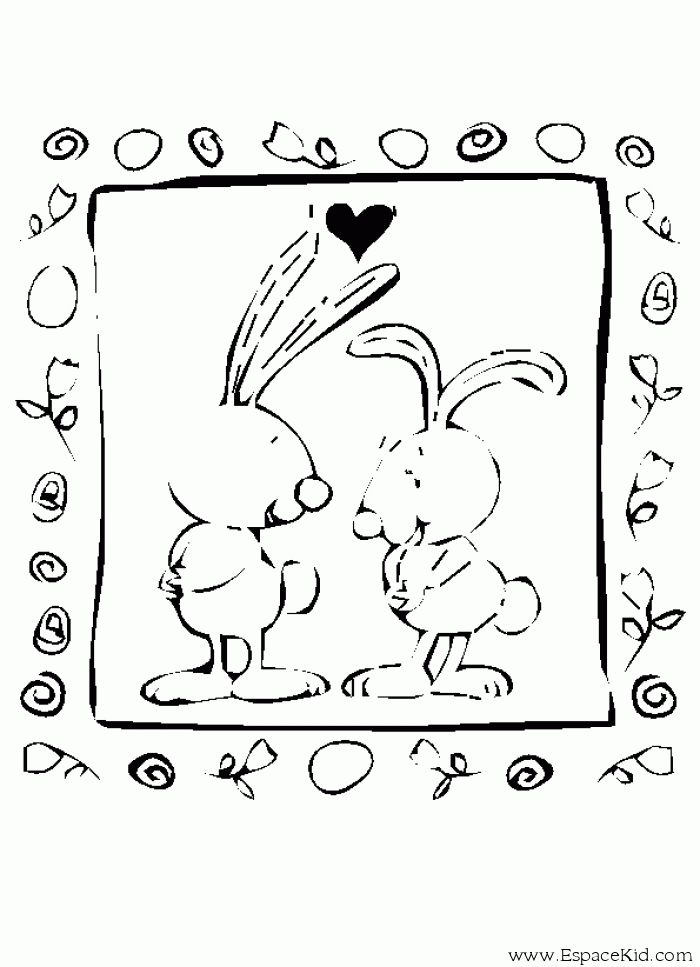 Lapin mignon entouré de fleurs dans un jardin