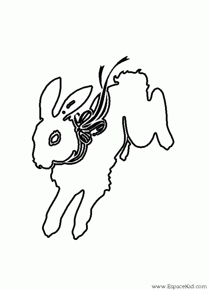 Un lapin joyeux dans un jardin fleuri