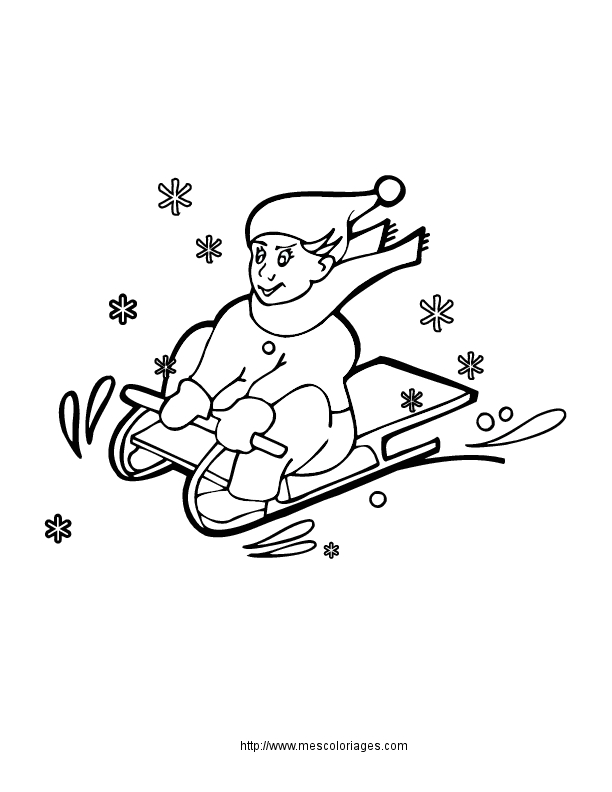 Un enfant s'amusant sur une luge dans un paysage hivernal