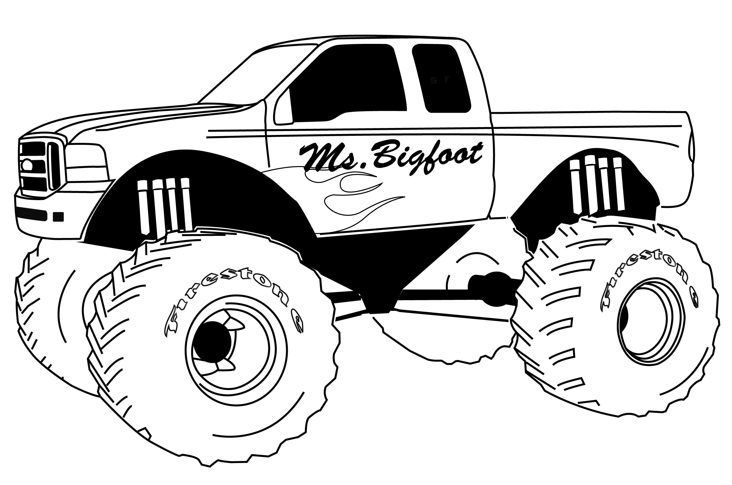 Un monster truck sur une route en terre battue
