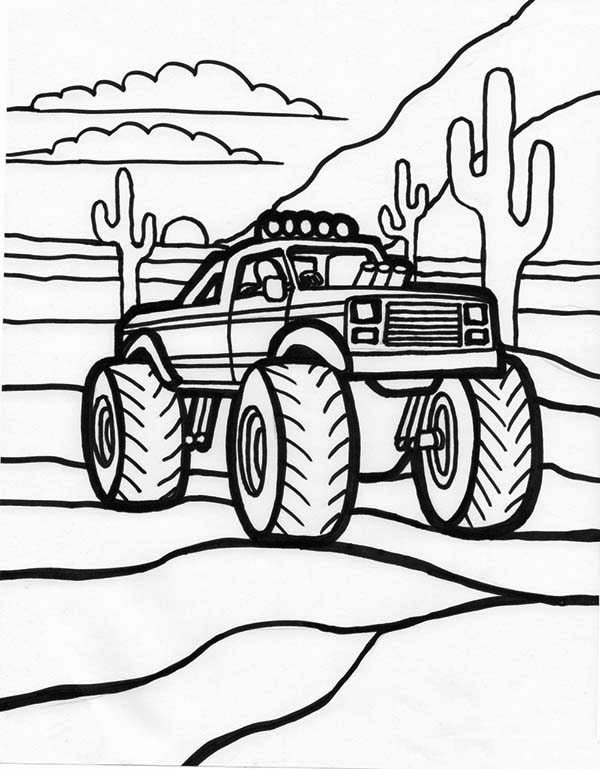Coloriage d'un monster truck en pleine action sur un terrain accidenté Coloriage d'un monster truck en pleine action sur un terrain accidenté