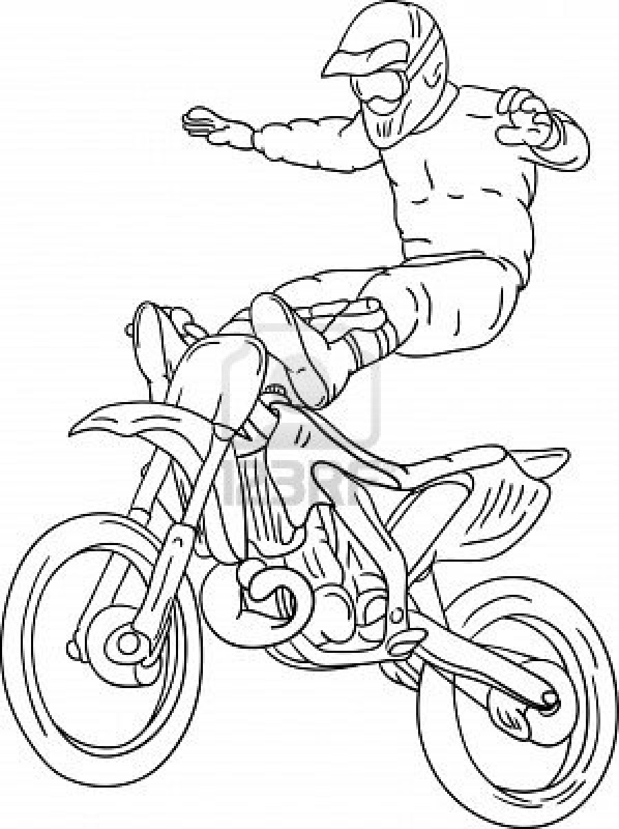 Motocycliste en pleine action sur un terrain de motocross