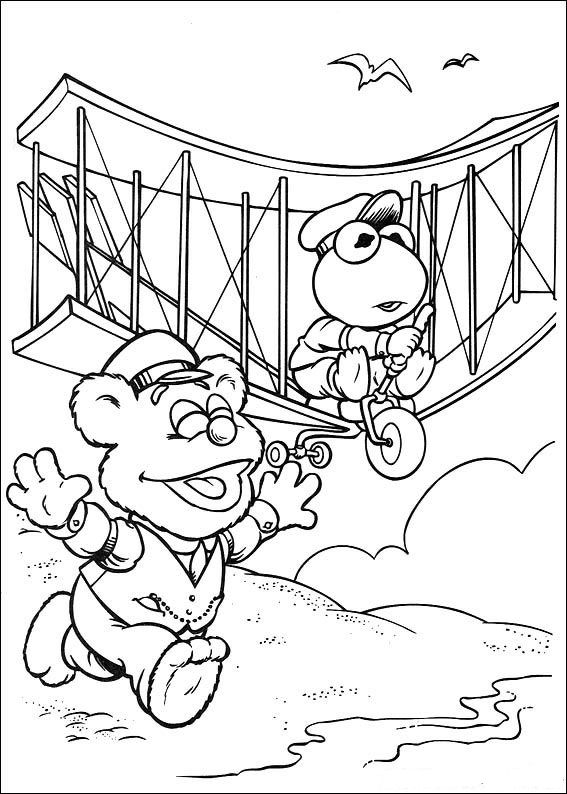 Les Muppets en pleine scène de comédie sur fond de décor théâtral