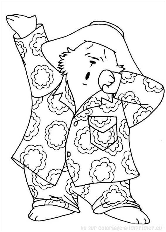 Coloriage d'un ours mignon assis sur un rocher dans la forêt