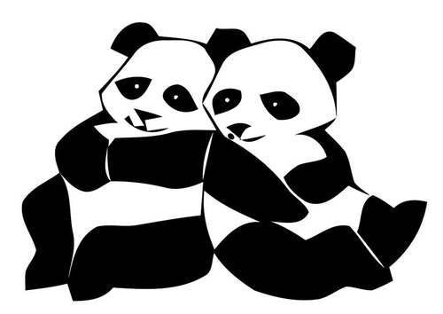 Un panda mignon assis sur un rocher entouré de végétation