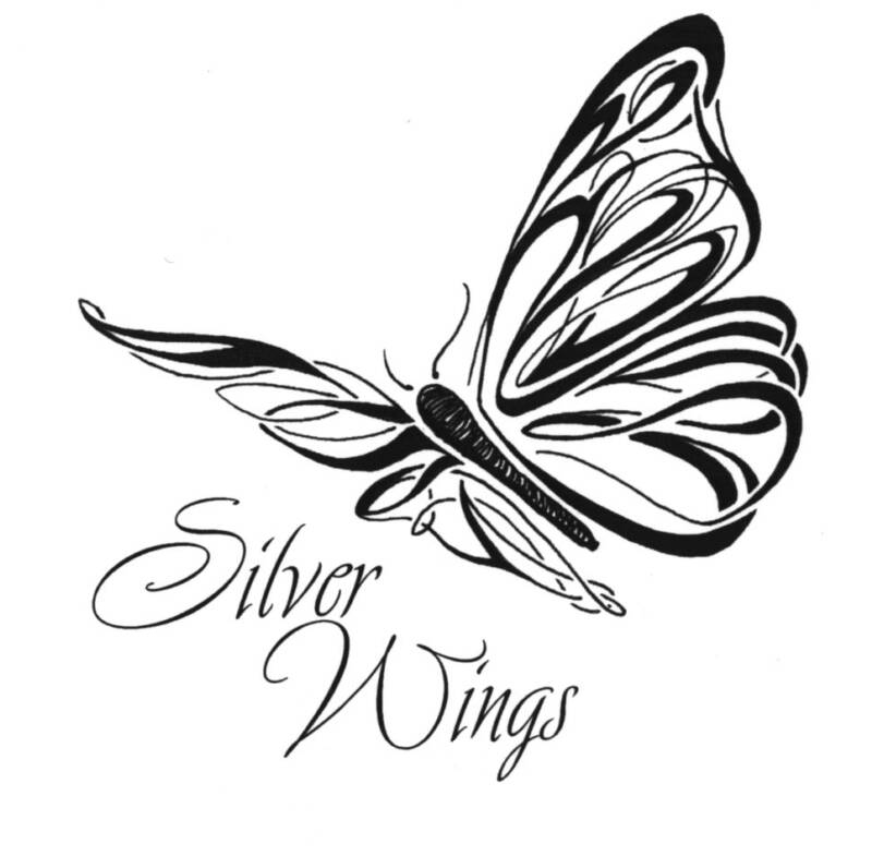 Coloriage d'un papillon avec motifs floraux et décor naturel