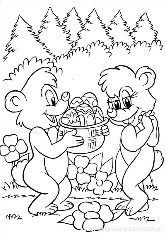 Coloriage de Pâques avec des œufs décorés et un lapin joyeux