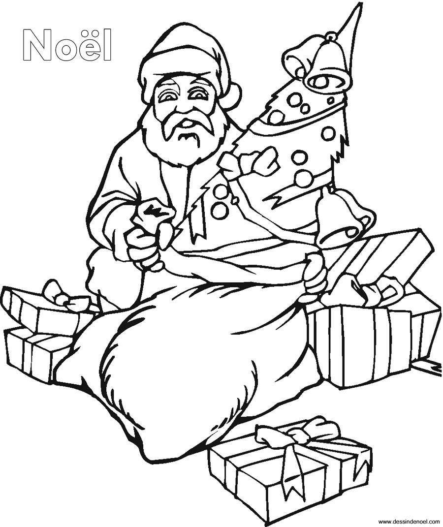 Père Noël riant joyeusement dans son atelier