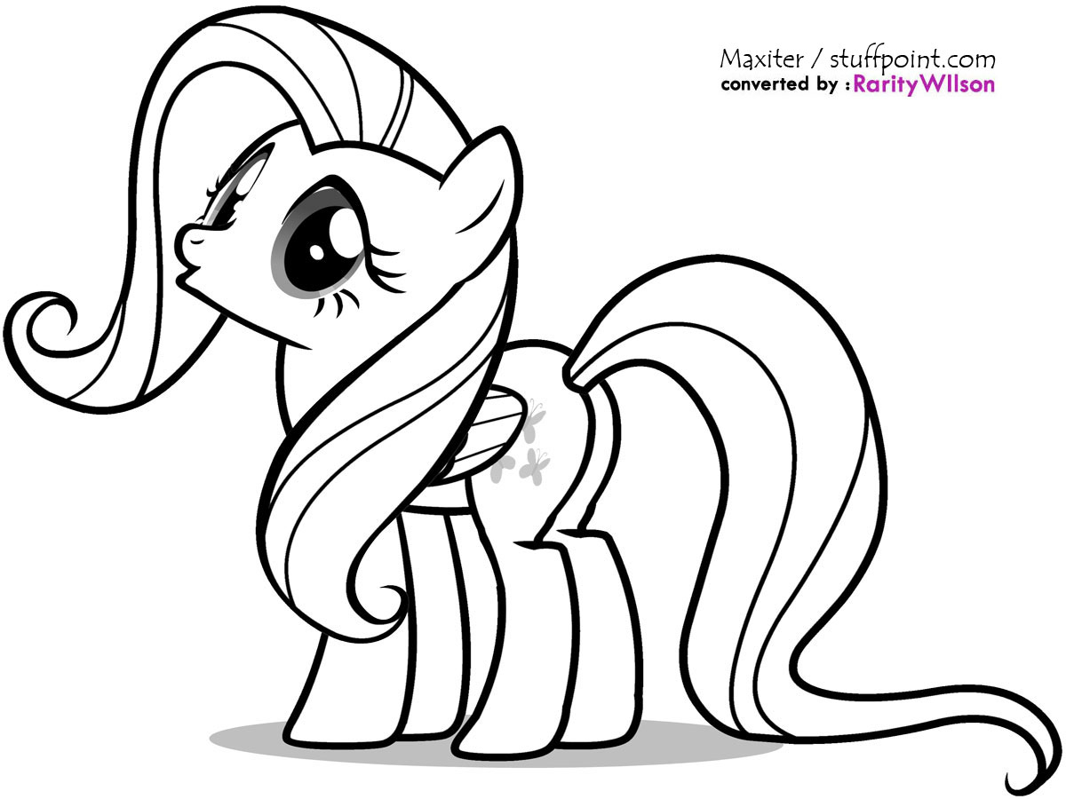 Coloriage d'un petit poney gambadant dans un champ fleuri
