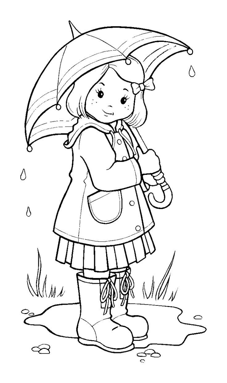 Un enfant jouant sous la pluie avec un parapluie coloré