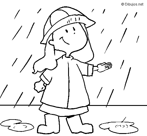 Un enfant jouant sous la pluie avec un parapluie coloré