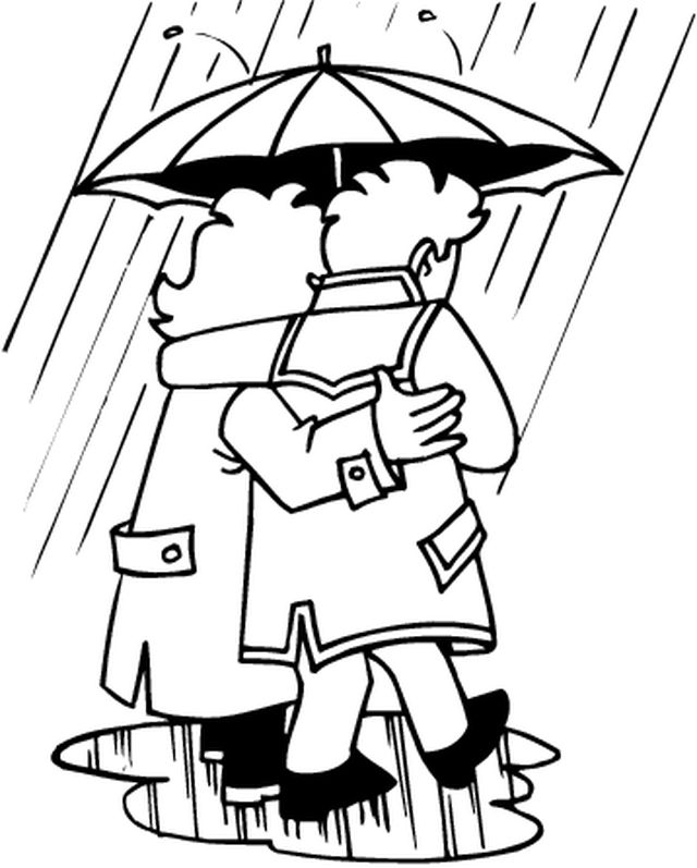 Un enfant sous la pluie avec un parapluie et des gouttes d'eau