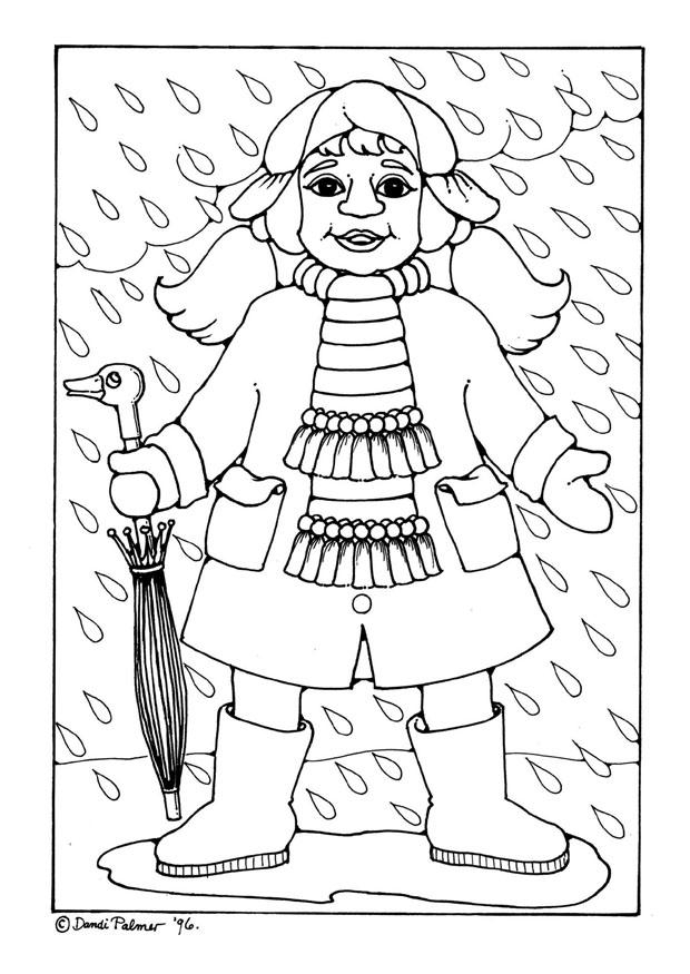 Enfant jouant sous la pluie avec un parapluie dans un décor naturel