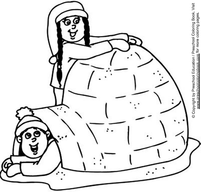 Un enfant construit un bonhomme de neige sous un ciel d'hiver Un enfant construit un bonhomme de neige sous un ciel d'hiver