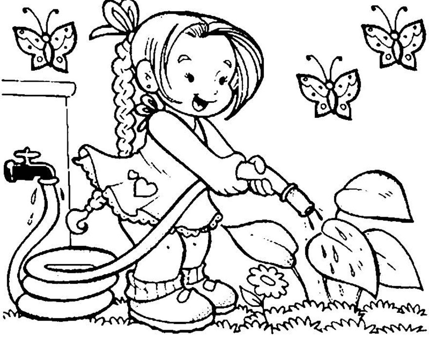 Un enfant s'amuse à colorier un paysage printanier avec des fleurs et un arbre