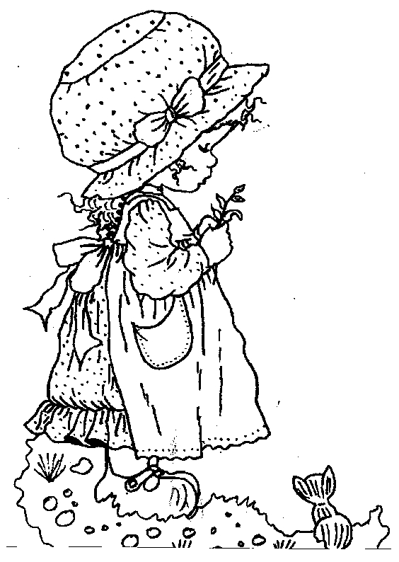 Une jeune fille assise sur l'herbe entourée de fleurs