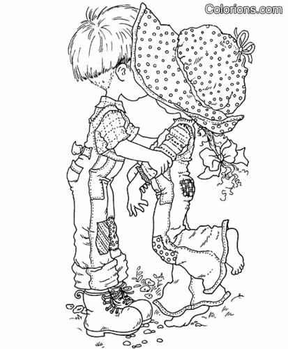 Une petite fille en train de jouer avec son chien dans un jardin fleuri