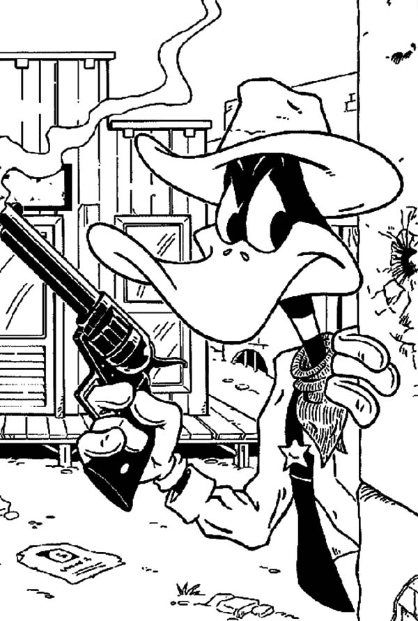 Coloriage d'un shérif en action dans une ville du Far West Coloriage d'un shérif en action dans une ville du Far West