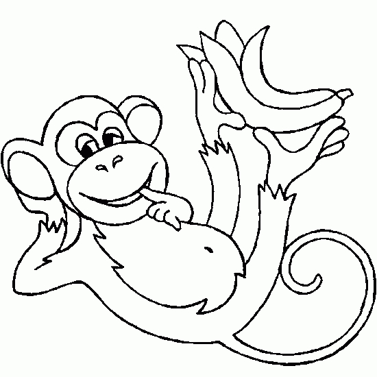 Un singe souriant suspendu à une branche dans la jungle