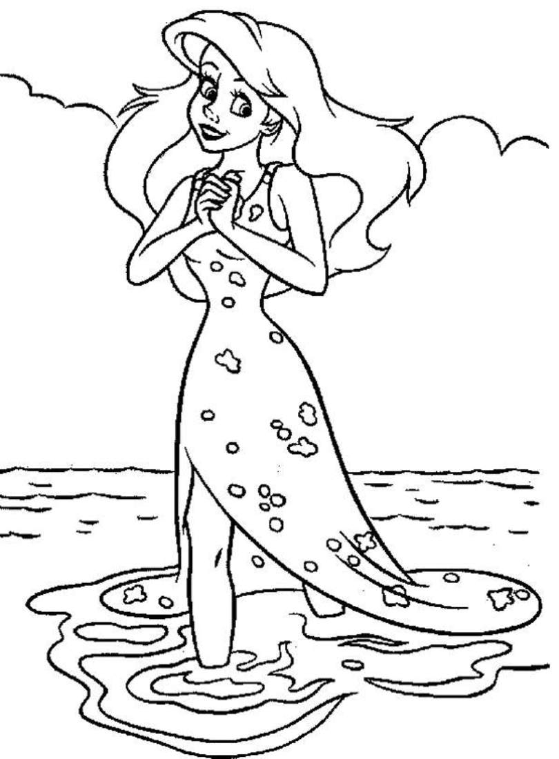 Coloriage d'une sirène se reposant sur un rocher au bord de la mer