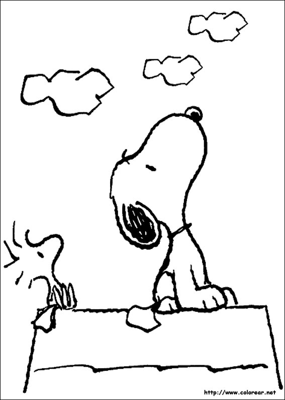 Snoopy en pleine réflexion sous un arbre
