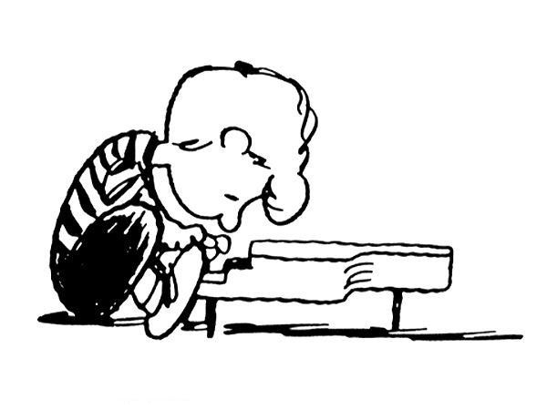 Snoopy en pleine sieste sur son doghouse
