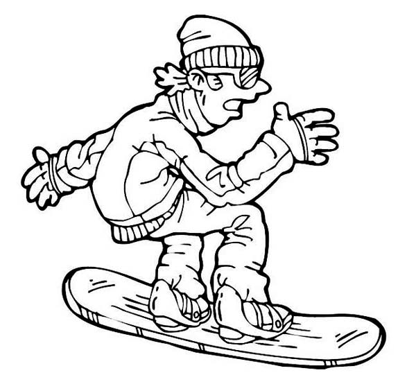 Un adolescent en action sur sa planche à neige dans un paysage hivernal