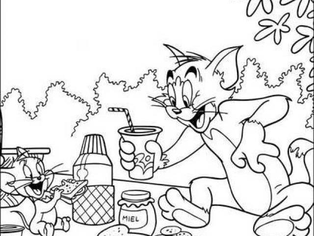 Tom et Jerry en pleine course-poursuite dans un décor animé