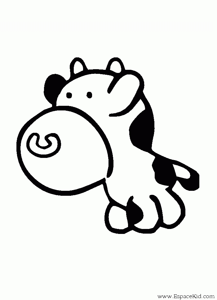 Vache paisible dans un champ verdoyant