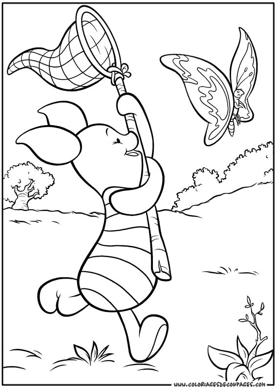 Winnie l'Ourson assis sur l'herbe avec un pot de miel