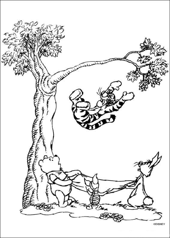 Winnie l'Ourson assis sur l'herbe avec son pot de miel